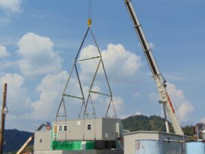 LGH rigging equipment lifting a chemical building