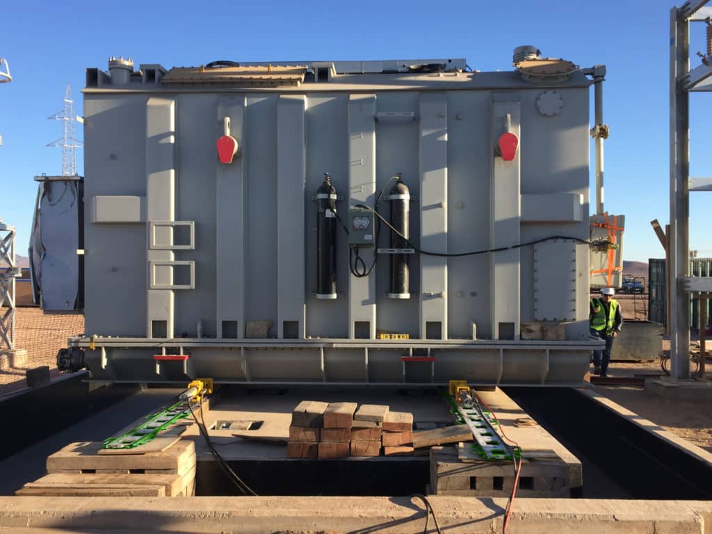 Jobsite pic of the Hydra-Slide XLP150 hydraulic skidding system in LGH green.