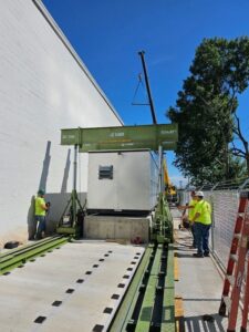 Jobsite picture featuring LGH hydraulic gantries and track from case study with J Haugh Cranes.