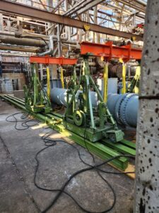 The first cylinder loaded onto the gantry system.