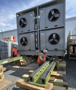 The hydra-slide heavy duty skidding system from LGH used to slide cooling units into a data center construction site